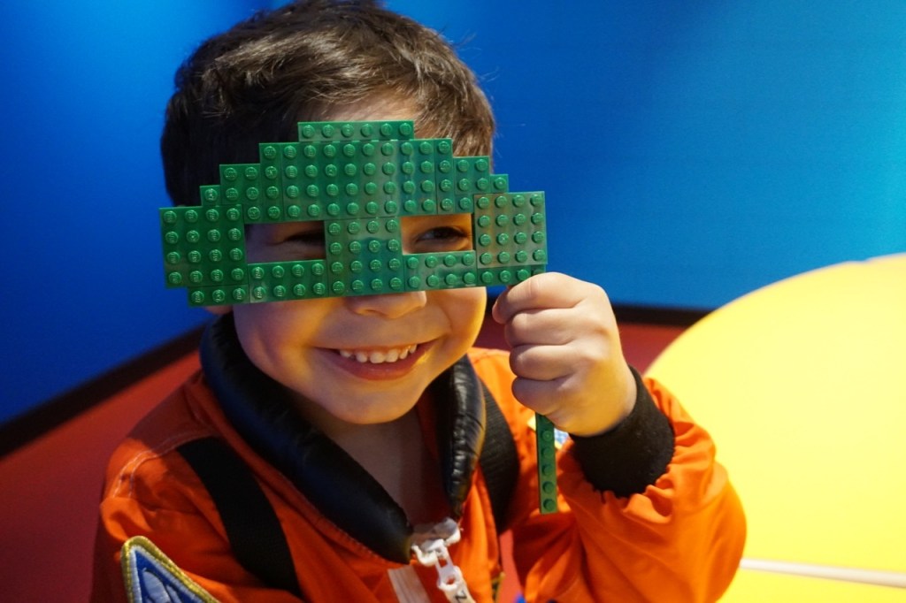 One of the activities at Brick or Treat is creating a mask out of LEGOS.