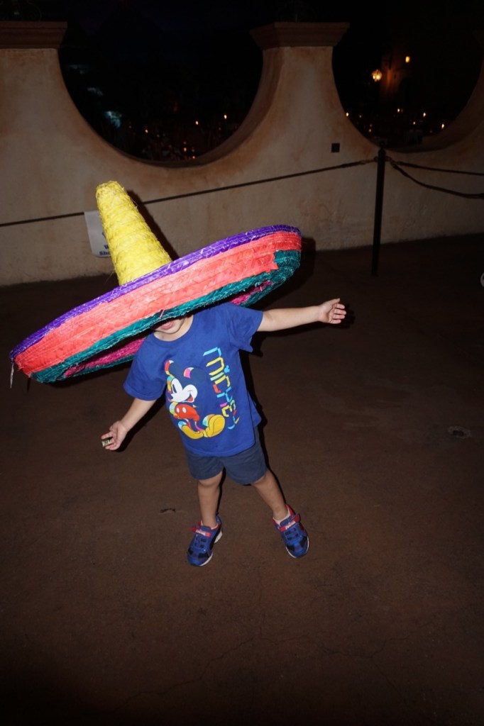 My son loved the Gran Fiesta ride at Epcot and tried on a sombrero!