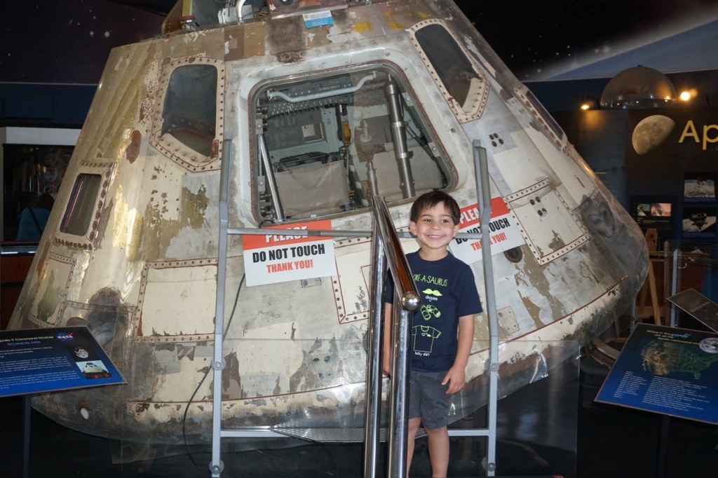 Standing in front of the Apollo 9 Command Module at the San Diego Air & Space Museum.