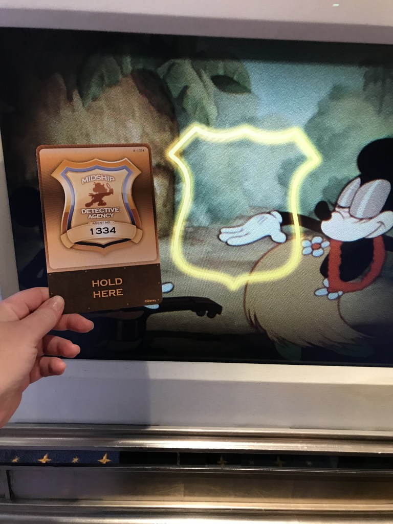 Some of the paintings on the Disney Dream Cruise are interactive for playing the Midship Detective Agency.