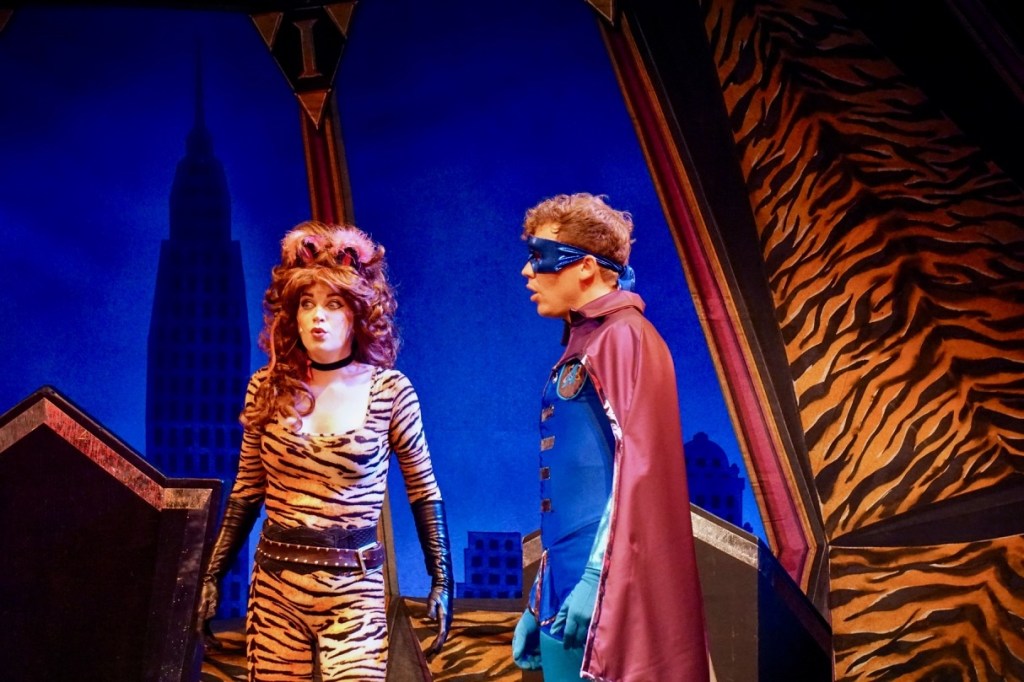 Tiger Lady, played by Janee Page, and Atom, played by Jake Chapman.
