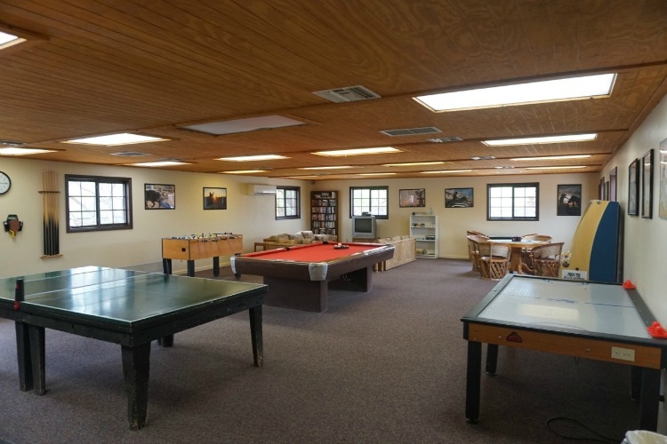 There are several games to play in the recreation room at the White Stallion Ranch.