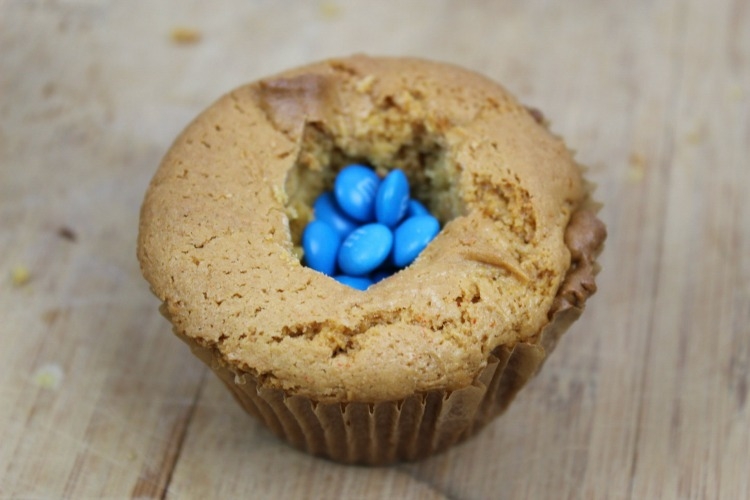 Place the mini M&Ms inside the cupcakes.