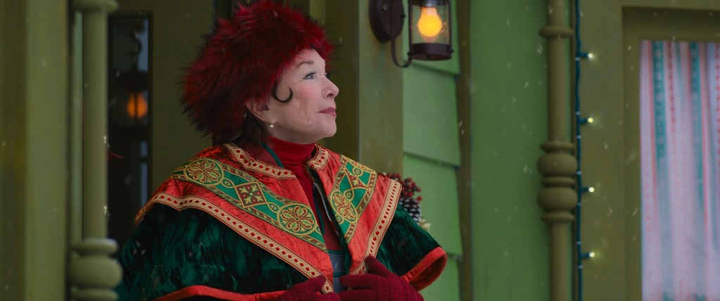 Shirley MacLaine as Polly, an Elf who helps Noelle try to find Nick. Photo by Disney Studios.