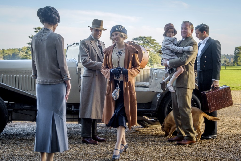 (l-r.) Elizabeth McGovern stars as Lady Grantham, Harry Hadden-Paton as Lord Hexham, Laura Carmichael as Lady Hexham, Hugh Bonneville as Lord Grantham and Michael Fox as Andy in DOWNTON ABBEY, a Focus Features release. Credit: Jaap Buitendijk / Focus Features