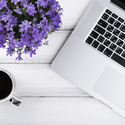 computer flowers and coffee contact