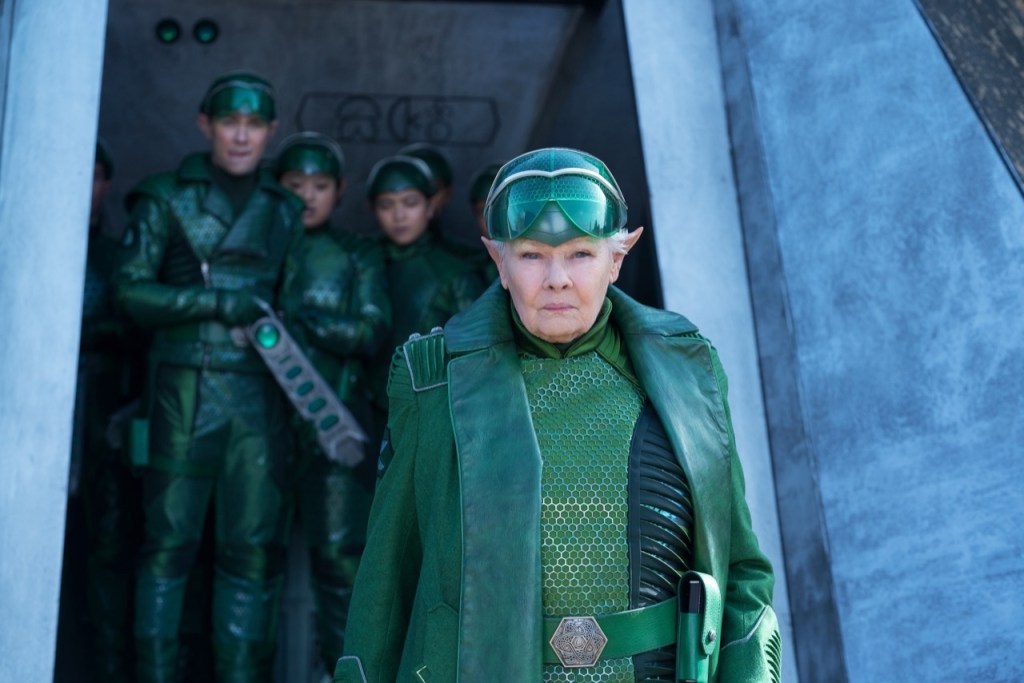 Dame Judy Dench as Commander Root.