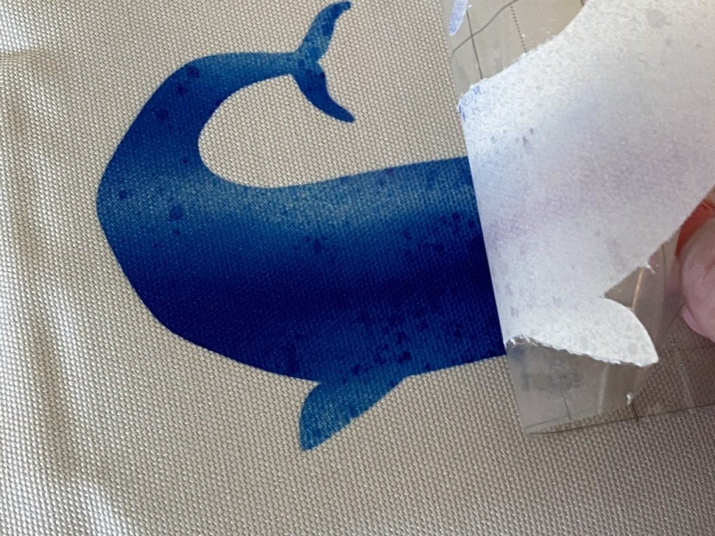 It is very easy to transfer the infusible ink to the tote bag.