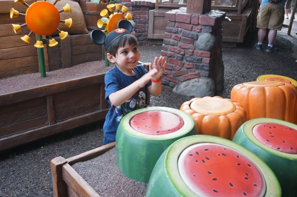 Disneyland vs. Disney World: My son loves the interactive queue at The Many Adventures of Winnie the Pooh in the Magic Kingdom.